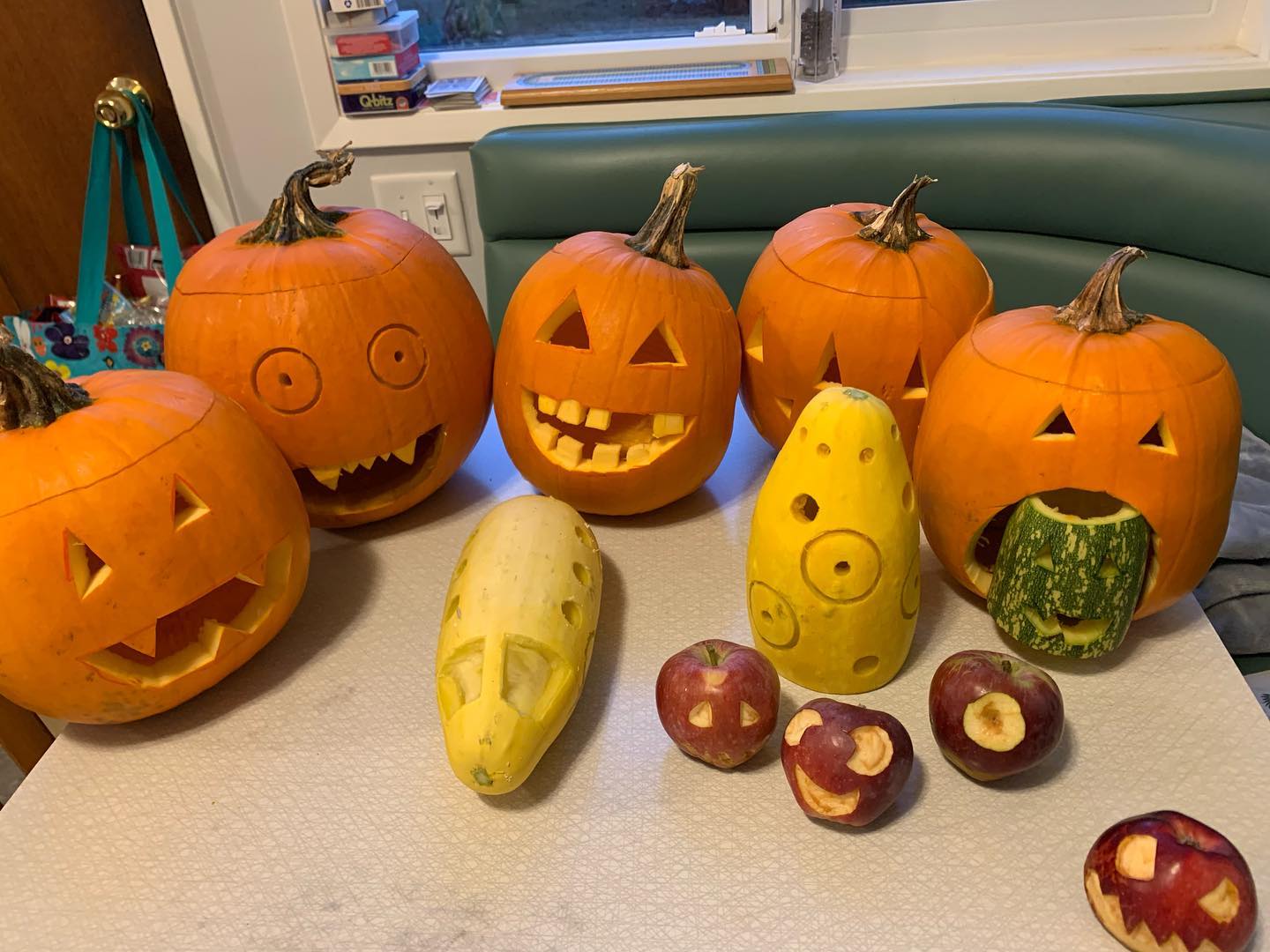 Pumpkins, and other thjngs, carved and ready for Halloween! #halloween #pumpkins #gourds #apples #jackolantern